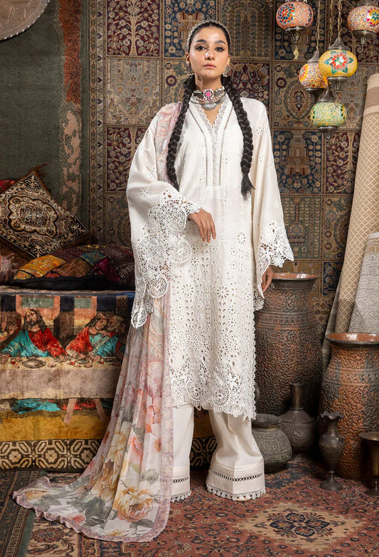 Suitlo's Pakistani collection, featuring intricate prints and elegant lawn shirts inspired by bustling bazaars. Each outfit, paired with a flowing dupatta, blends timeless stories of style and grace. Shop online for branded ensembles perfect for women seeking tradition and modernity.